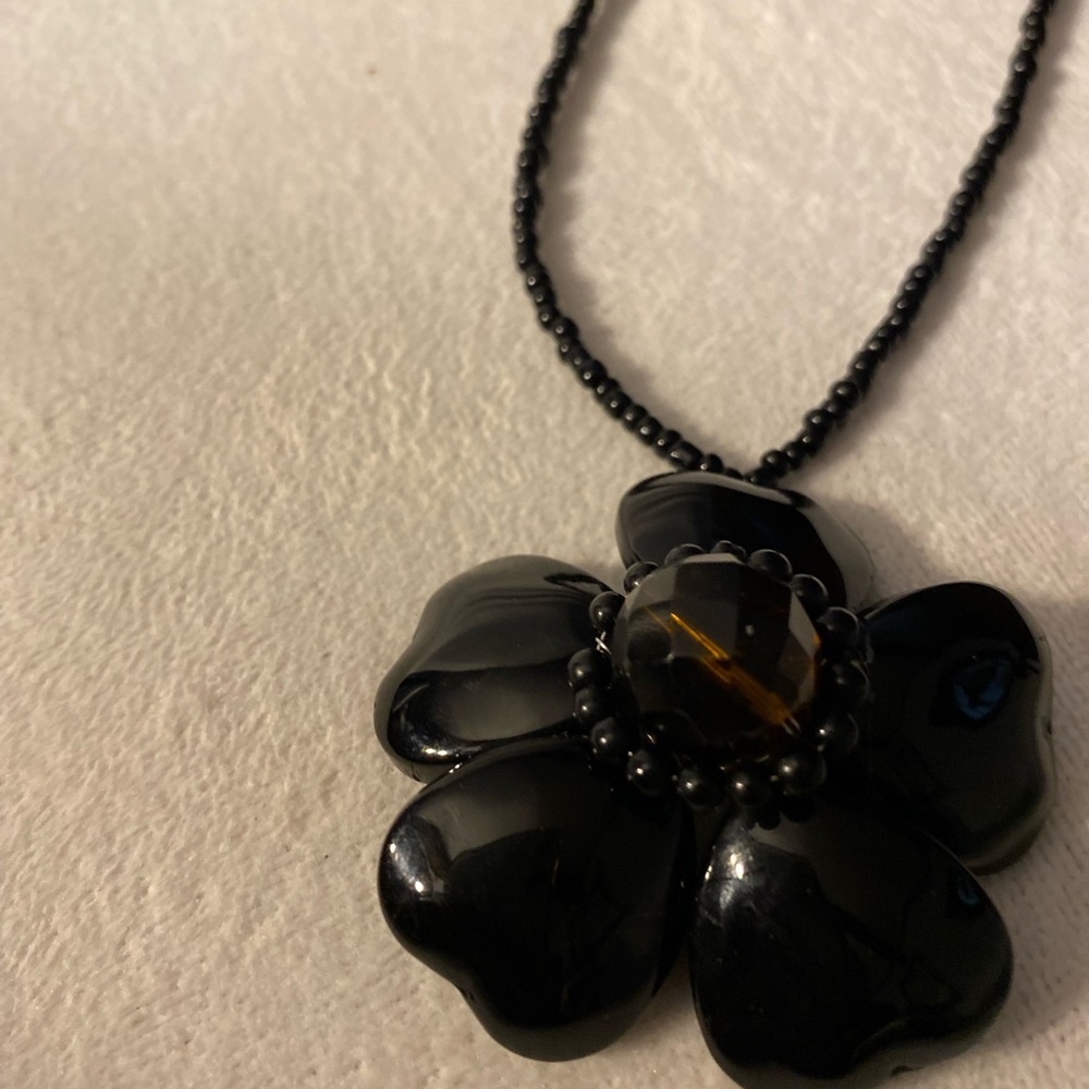 Black flower necklace other side black and silver